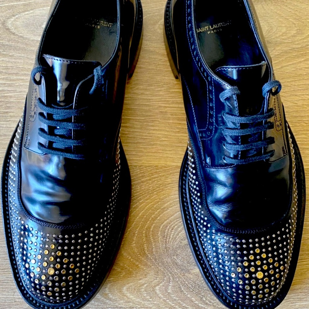 Super fashionable lace up shoes by Saint Laurent.